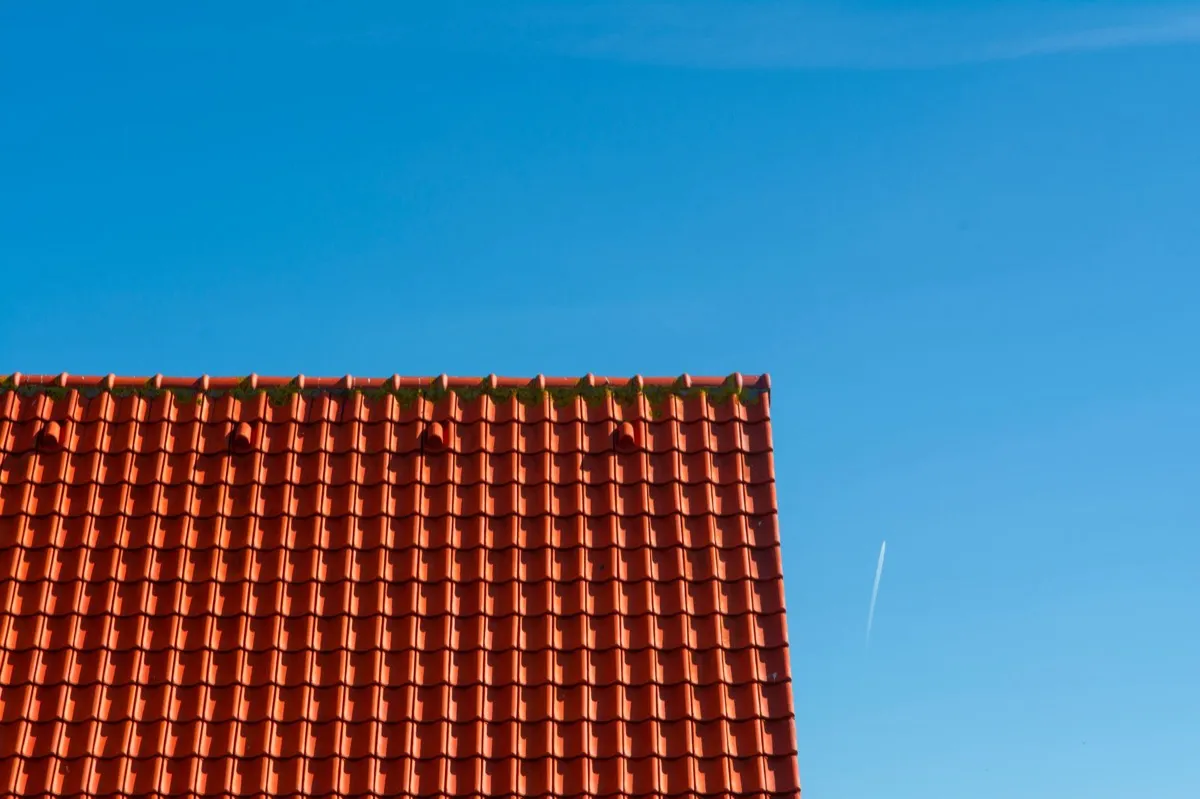 Tile roof gable in full sun, the kind of exposure that sets roof life in Lacey, WA